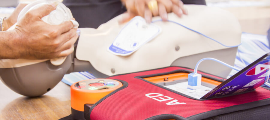 CPR with AED training on mannequin