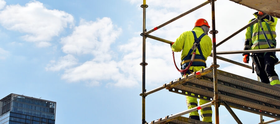 Construction workers on scaffolding