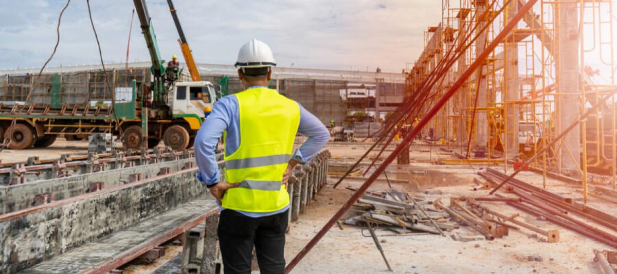 Supervising the construction of a tower crane on construction site